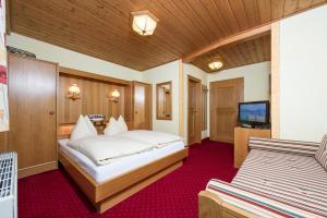 Postel nebo postele na pokoji v ubytování Hotel Sonnhof