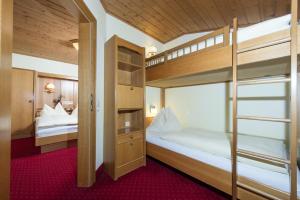 Postel nebo postele na pokoji v ubytování Hotel Sonnhof