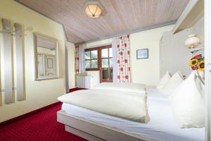 Postel nebo postele na pokoji v ubytování Hotel Sonnhof