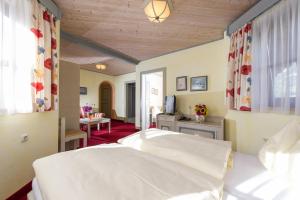 Postel nebo postele na pokoji v ubytování Hotel Sonnhof
