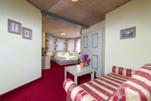 Postel nebo postele na pokoji v ubytování Hotel Sonnhof