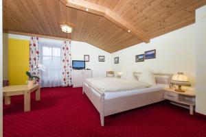 Postel nebo postele na pokoji v ubytování Hotel Sonnhof