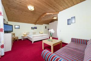 Postel nebo postele na pokoji v ubytování Hotel Sonnhof