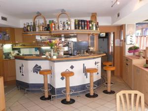 A área de bar ou lounge em Hotel Gletschermühle