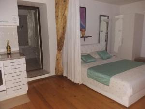 Postel nebo postele na pokoji v ubytování Apartments Rale