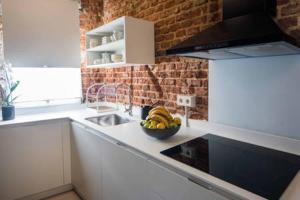 Kuchyň nebo kuchyňský kout v ubytování Premium Piso Loft de 3 habitaciones en centro histórico