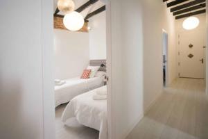 Postel nebo postele na pokoji v ubytování Premium Piso Loft de 3 habitaciones en centro histórico