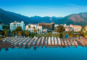 a view of a resort with a bunch of boats at Elite World Marmaris - Adult Only in Marmaris