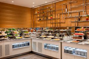 a bakery with a lot of food on display at Elite World Marmaris - Adult Only in Marmaris