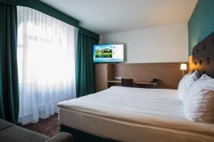 Postelja oz. postelje v sobi nastanitve Hotel Galatea