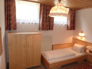 Łóżko lub łóżka w pokoju w obiekcie Pension Appartement Ambrosi