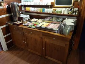 a counter with some food on top of it at Chata Betyna in Pec pod Sněžkou