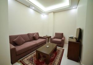 Zona de estar de Al Jawhara Suites