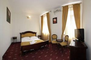 Кровать или кровати в номере Hotel Maryo