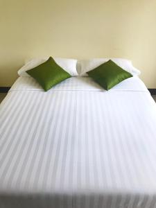 Postel nebo postele na pokoji v ubytování T.P. Place Hotel