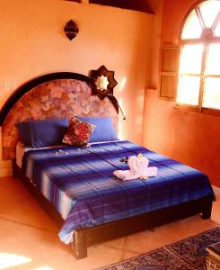 Postel nebo postele na pokoji v ubytování Latifa House