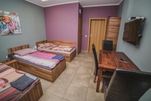 Posteľ alebo postele v izbe v ubytovaní Noclegi Andersa