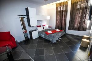Postel nebo postele na pokoji v ubytování Trendy Living in Monastiraki