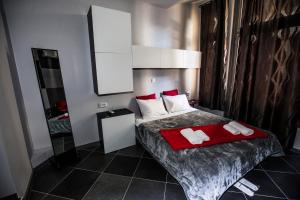 Postel nebo postele na pokoji v ubytování Trendy Living in Monastiraki