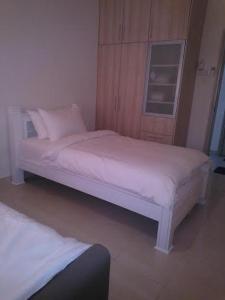 Cama o camas de una habitación en 8 O'Clock Condo Service - Bandar Utama, PJ - Kuala Lumpur
