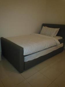 Cama o camas de una habitación en 8 O'Clock Condo Service - Bandar Utama, PJ - Kuala Lumpur