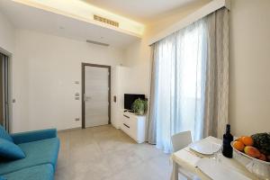 TV a/nebo společenská místnost v ubytování Hotel & Residence Cavalluccio Marino