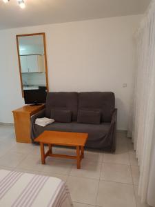 Część wypoczynkowa w obiekcie Apartamentos Olympia Garden