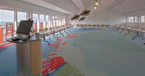 a swimming pool with a painting on the floor at Hotel Arctic in Ilulissat