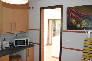 Kuchyňa alebo kuchynka v ubytovaní Apartamento con Terraza a 5 min playa