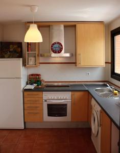 Kuchyňa alebo kuchynka v ubytovaní Apartamento con Terraza a 5 min playa