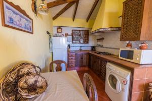 Kuchyň nebo kuchyňský kout v ubytování Casa Abuelo Buenaventura + 13 fotografií