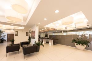 Coin salon dans l'établissement Alimounda Mare Hotel