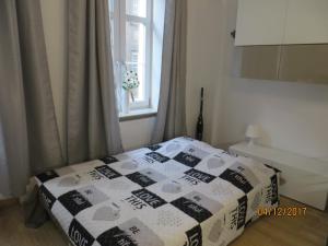 Łóżko lub łóżka w pokoju w obiekcie Stay99
