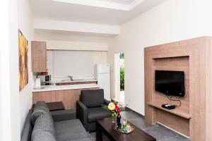 TV o dispositivi per l'intrattenimento presso Helios Bay Hotel and Suites