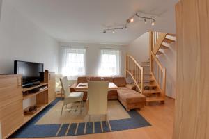 Televiisor ja/või meelelahutuskeskus majutusasutuses Katschberg Appartements