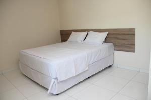 Postel nebo postele na pokoji v ubytování Hotel Executive