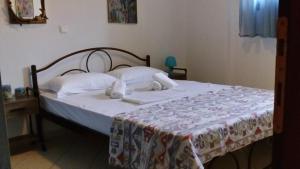 Posteľ alebo postele v izbe v ubytovaní Natalia's Apartments