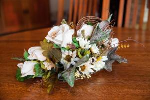 a bouquet of white flowers sitting on a table at Villa Edelweiss in Sveti Stefan