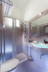 a bathroom with a shower and a sink at Hotel Garden in Cesenatico