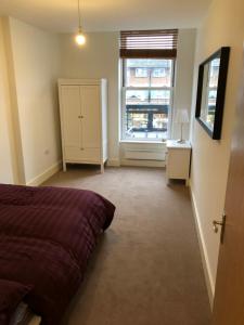 Postel nebo postele na pokoji v ubytování Spacious Clapham Apartments