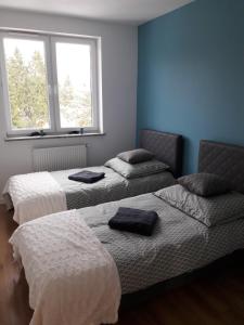 Posteľ alebo postele v izbe v ubytovaní Apart Hotel 37 (108 m2)