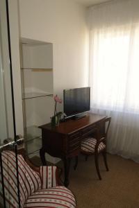 TV a/nebo společenská místnost v ubytování Apartman Brno Stred