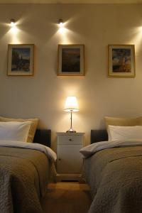 Postel nebo postele na pokoji v ubytování Apartman Brno Stred