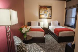 Posteľ alebo postele v izbe v ubytovaní Hotel Fusion, a C-Two Hotel