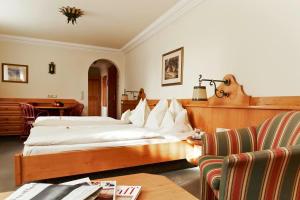 Postel nebo postele na pokoji v ubytování Hotel Lindner
