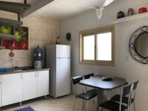 Kuhinja oz. manjša kuhinja v nastanitvi Chalé - Praia da Ferrugem