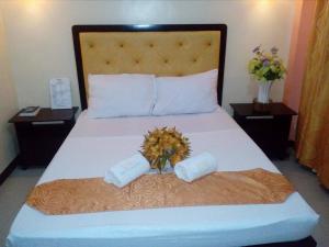 Postel nebo postele na pokoji v ubytování RSG Microhotel