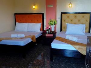 Postel nebo postele na pokoji v ubytování RSG Microhotel