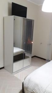 A bed or beds in a room at Il Centro Short Lets