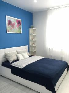 Llit o llits en una habitació de Apartment on Zakharova